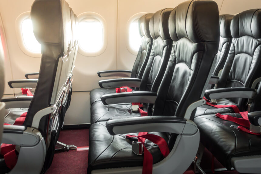 Airplane seats in the cabin .